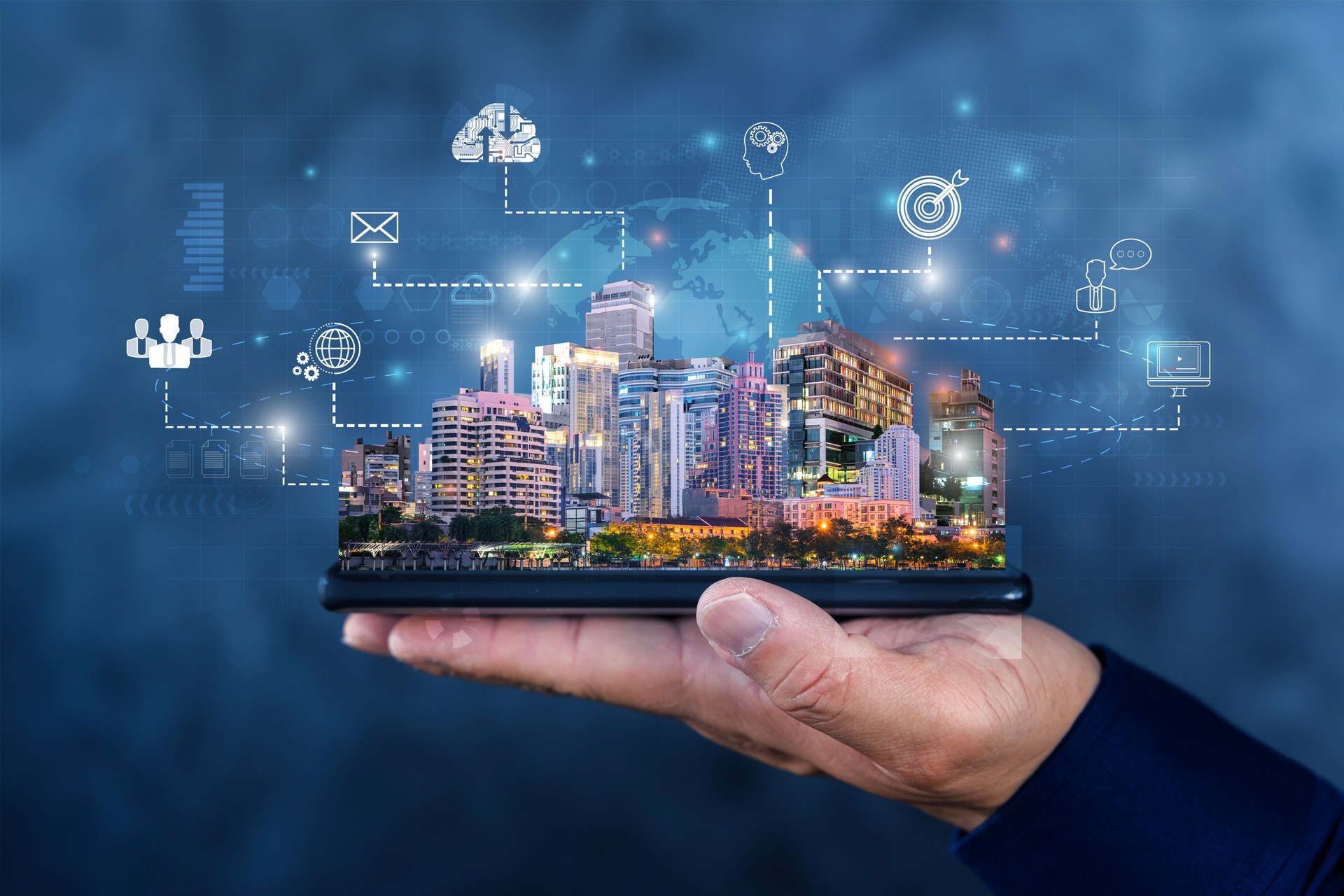 Cloud technology in smart city concept with human hand carries digital tablet with megapolis city skyscrapers.